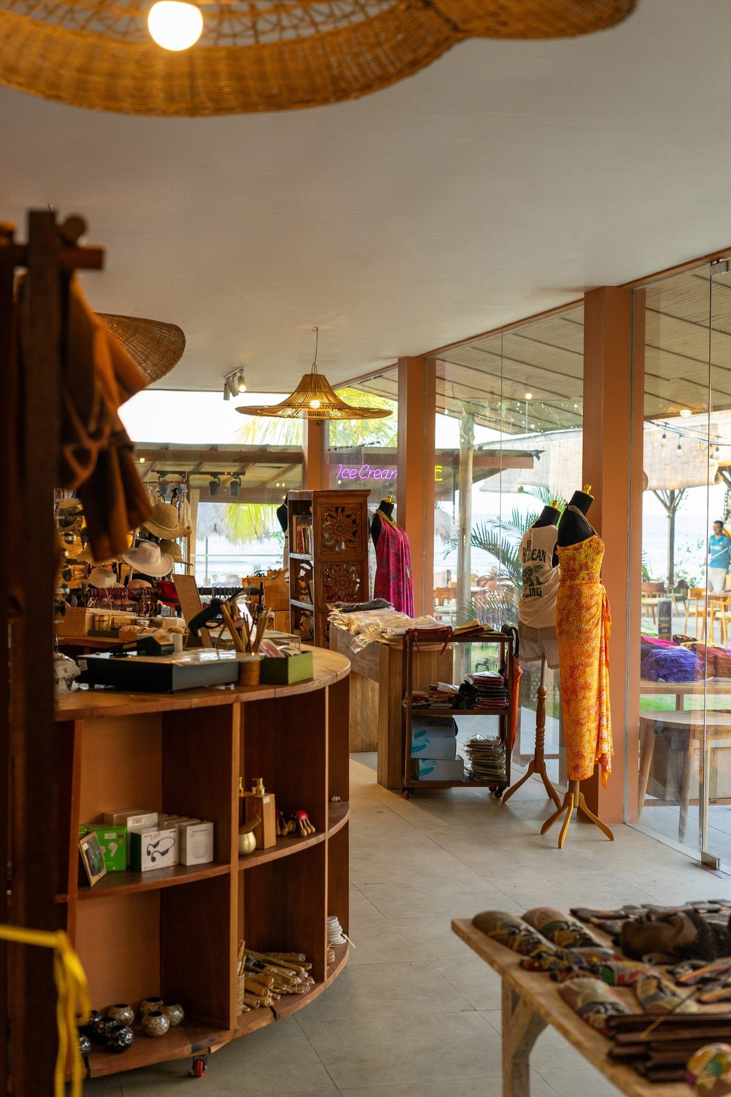 The boutique market inside the plaza: rattan lamps, sarongs, hats and handmade goods